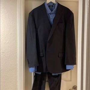 Rossini charcoal tux with light blue shirt.
